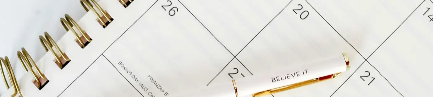 Calendar on desk representing therapist private practice planning and growth.